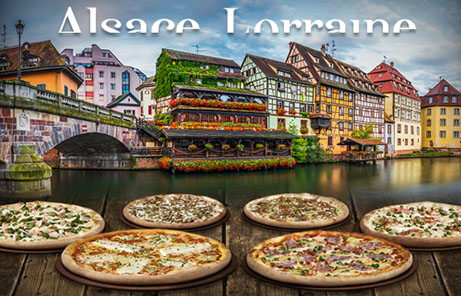 6 nouvelles pizzas Basilic & Co en photo posées. En arrière plan on distingue les maisons en colombage de Strasbourg fleuries.